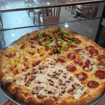 Large pizza with a different topping on each section